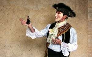 Image shows an actor in a mask.