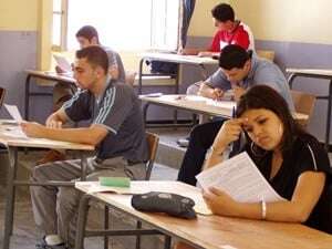Image shows Algerian students sitting the bac.