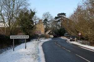 A wintry approach to the village.