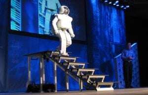 Image shows a Honda robot walking downstairs.