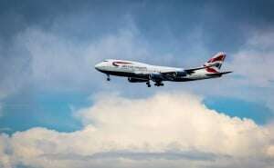 Image shows a British Airways aircraft in flight.