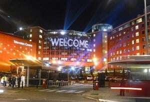 Image shows the BBC Television Centre with the word "welcome" in lights across the front. 