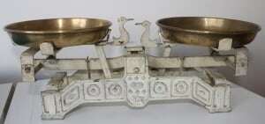 Image shows a pair of old-fashioned weighing scales.