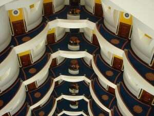 Image shows the interior of the Dubai luxury hotel, the Burj Al-Arab.