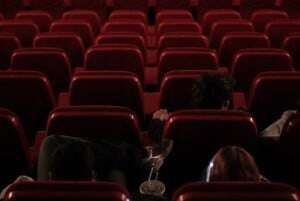Image shows the seating in a darkened cinema.