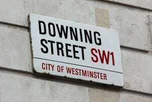 Image shows the sign for Downing Street.
