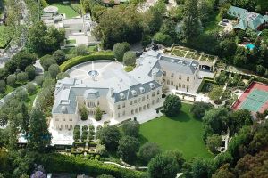 Image shows a mansion of a house. 