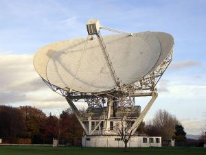 Image shows one of the telescopes at Jodrell Bank Observatory.