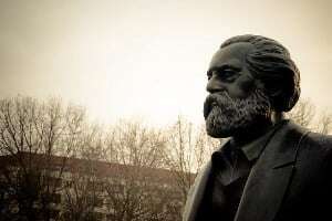 Image shows a statue of Marx.