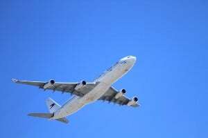 Image shows a plane taking off.