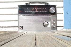 Image shows a 70s-style solid state radio.