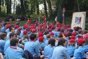 Image shows a large number of Scouts listening to a Scoutmaster.