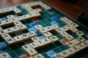 Image shows a Scrabble board. 