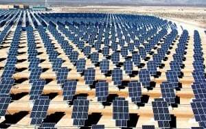 Image shows an array of solar panels.