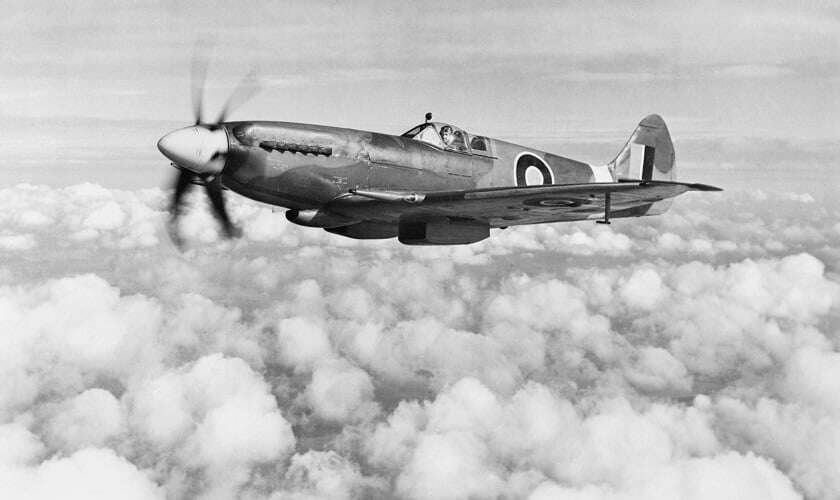 Image shows a black and white photograph of a Spitfire.