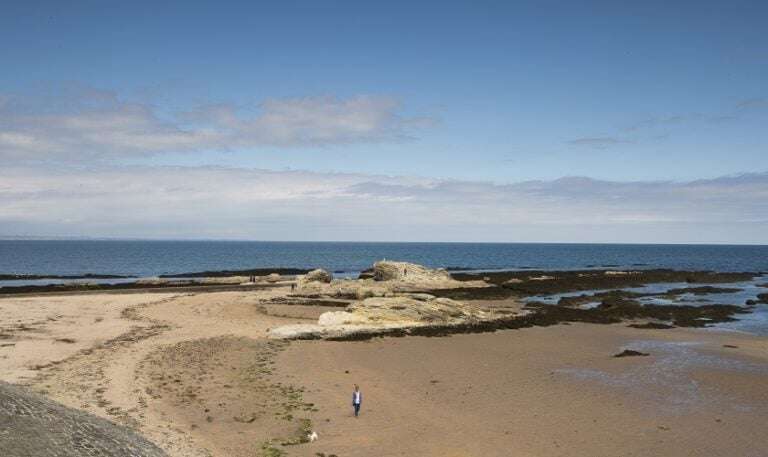Image shows West Sands Beach, looking over the sea.