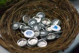 Image shows a nest of Twitter-themed button.