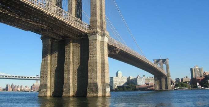 Image shows Brooklyn Bridge in New York.