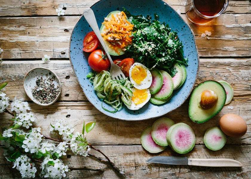 A healthy salad on a table.