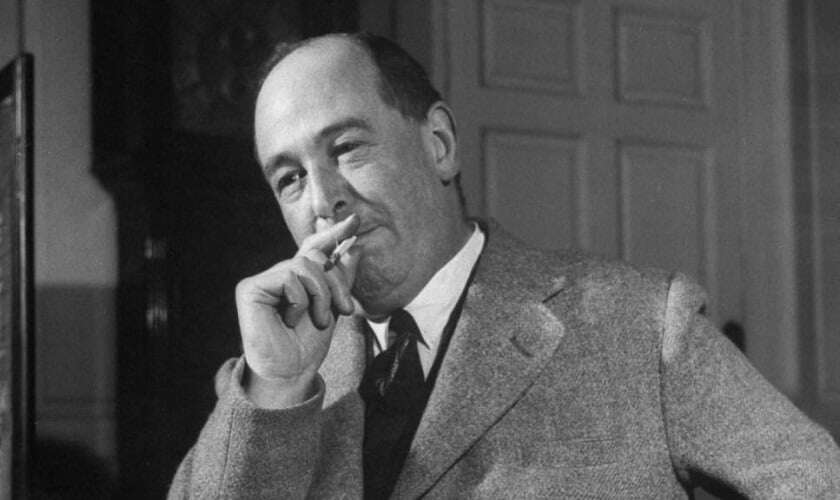 Image shows CS Lewis smoking a cigarette. 