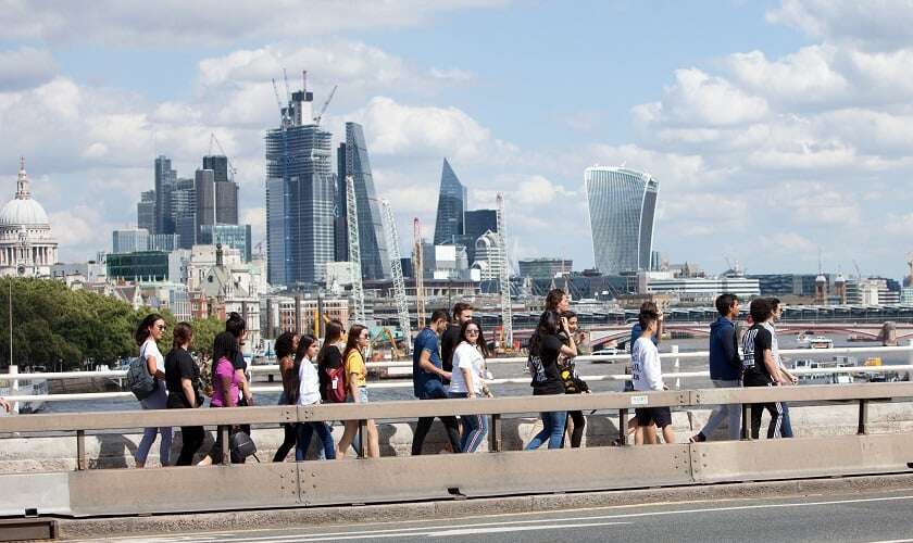 Image shows ORA students in London, with skyscrapers in the background.
